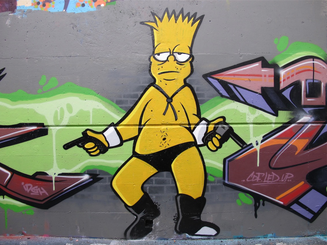 Pistola de graffiti de Los Simpson en mano